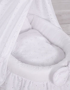 White lace drape wicker dolls Moses basket