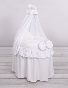 White lace drape wicker dolls Moses basket