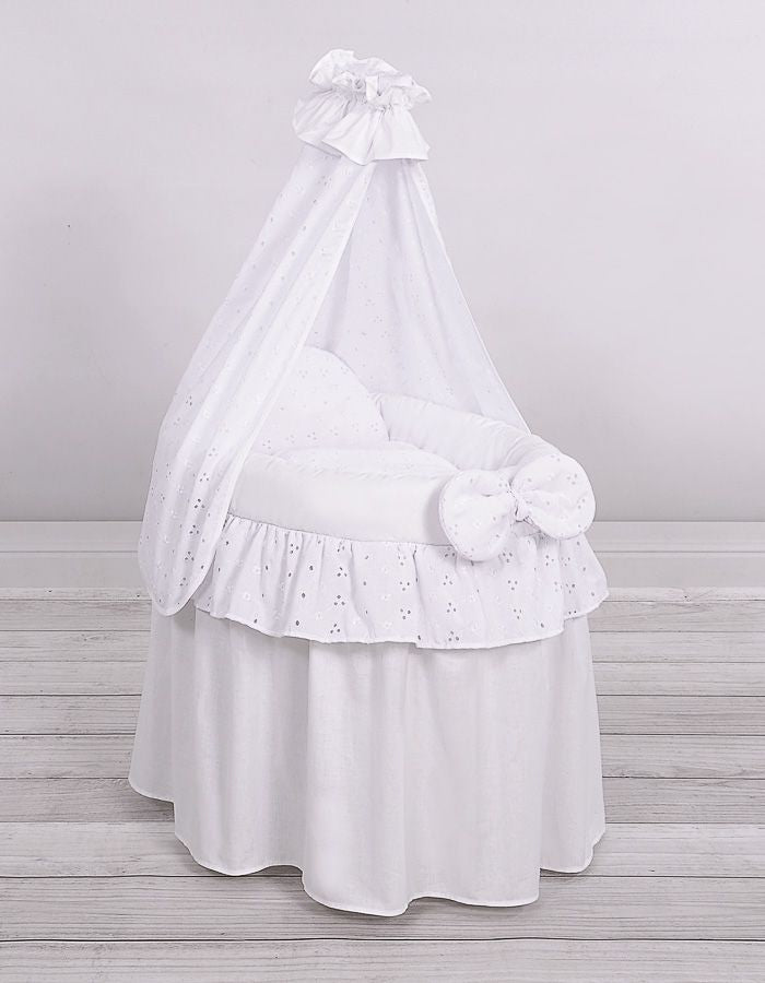 White lace drape wicker dolls Moses basket